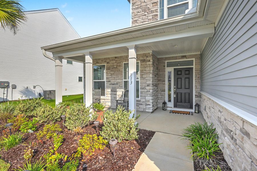 Exterior details and patio area of a home in Parker's Preserve, Ridgeville (Image 3).