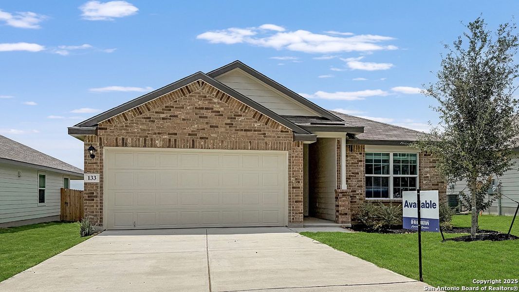 Front exterior of a new home in Redbird Ranch, San Antonio, TX, highlighting curb appeal (Image 1). Front exterior of a new home in Redbird Ranch, San Antonio, TX, highlighting curb appeal (Image 1).