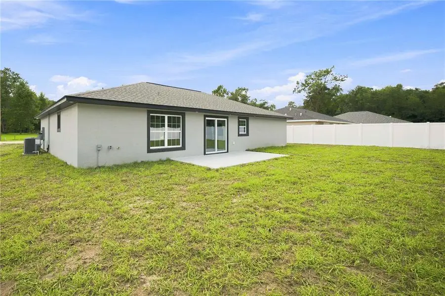 Exterior details and patio area of a home in , Ocala (Image 4).
