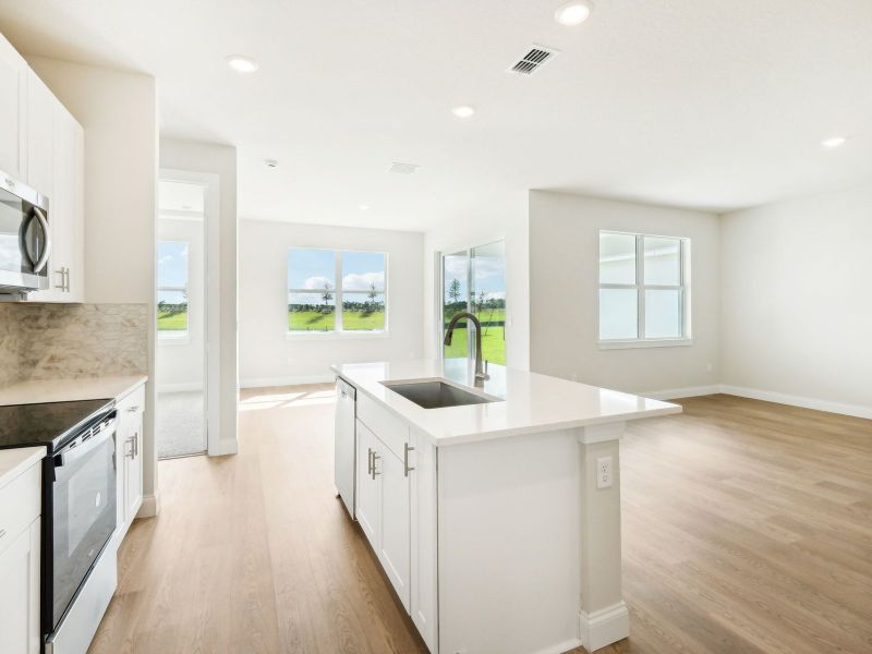 Kitchen in the Bergamo floorplan at 11306 NW Firefly Court