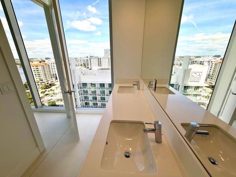 Guest suite bath with double-sink bathroom.