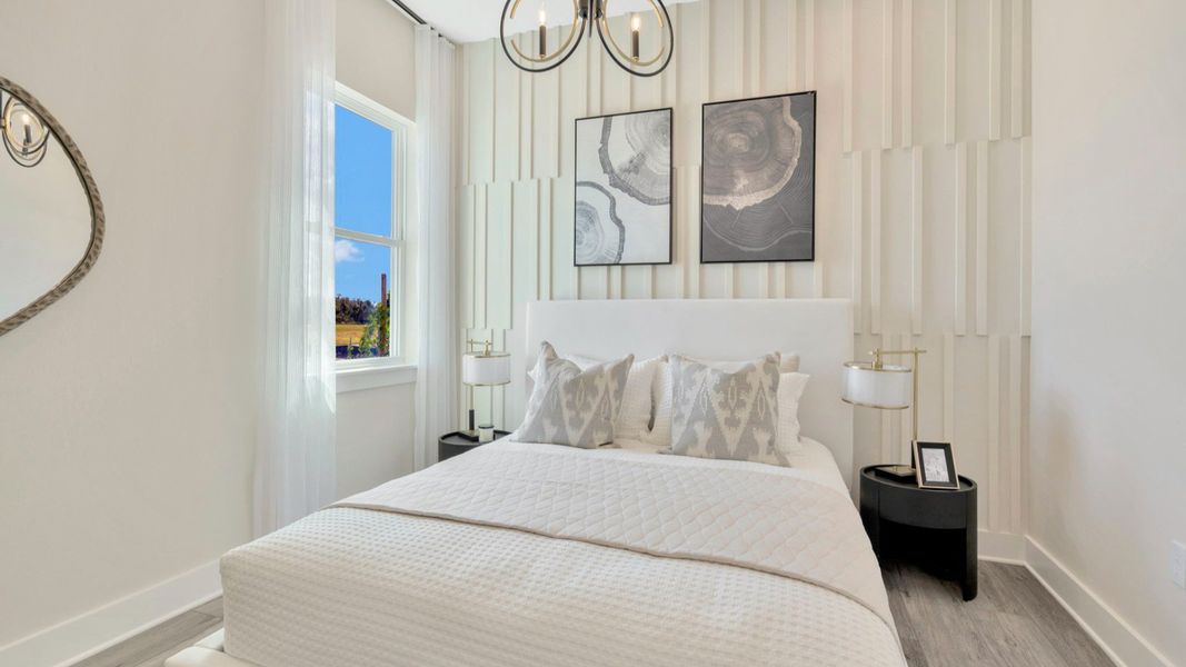 The Second Bedroom of a DRB Homes Grand Eider model, which is a home plan offered at Serengeti in Spring Hill, FL.