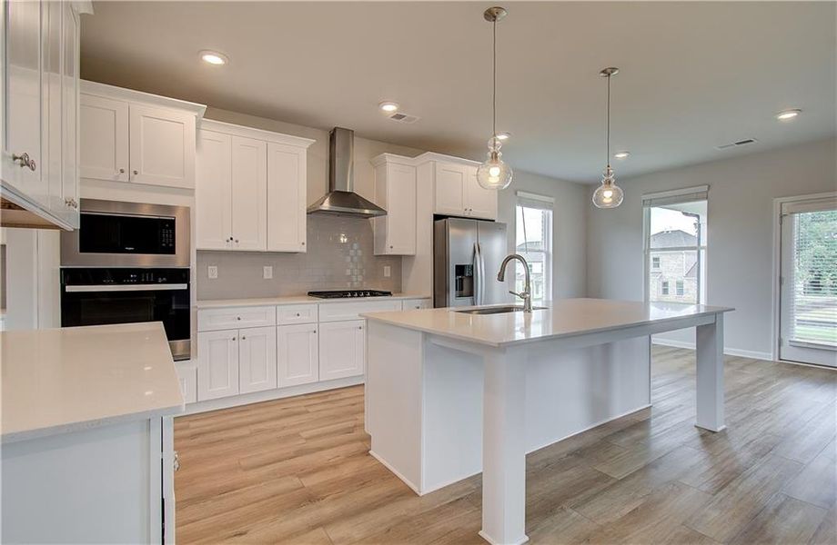 Furnished interior view inside a new home in Westwind Estates, Hampton (Image 3).