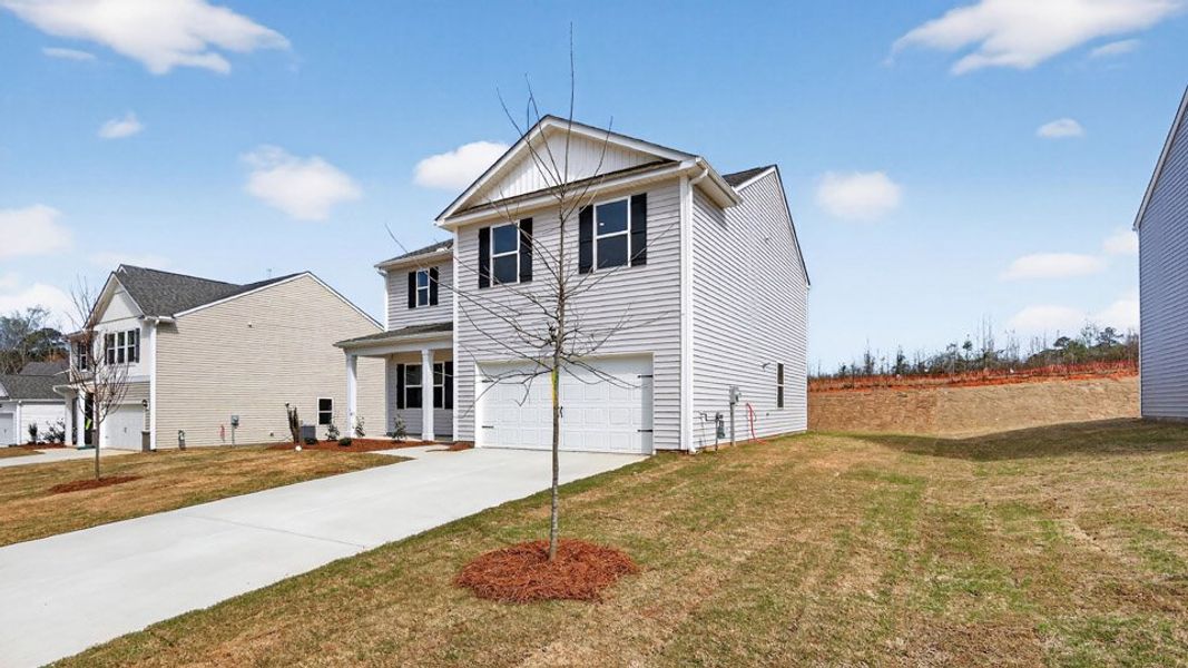 Front exterior of a new home in East Ridge, Ayden, NC, highlighting curb appeal (Image 18).
