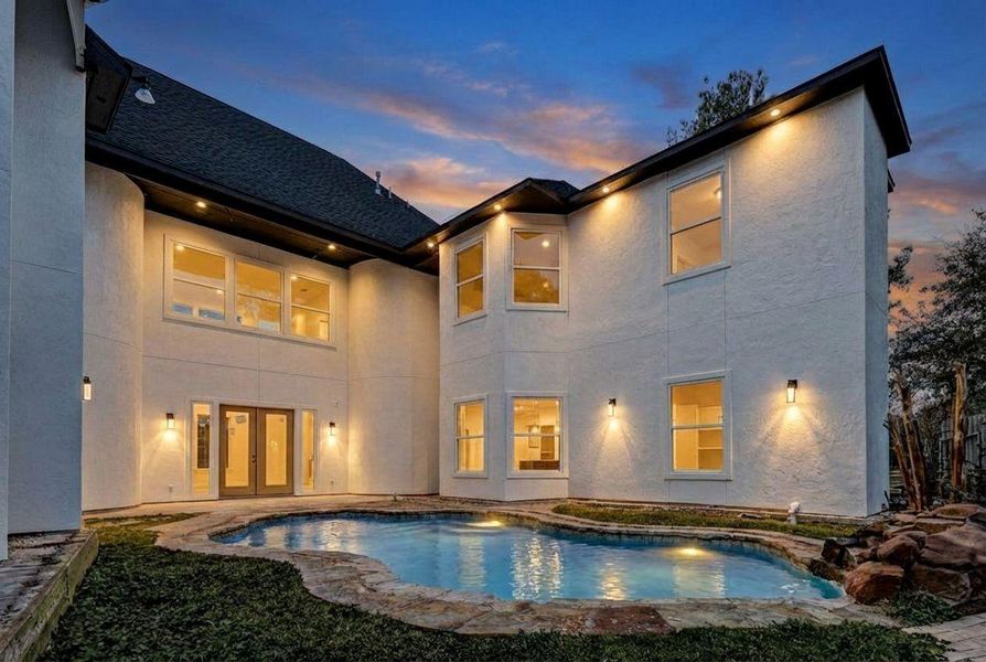 Exterior details and patio area of a home in , Spring (Image 3).