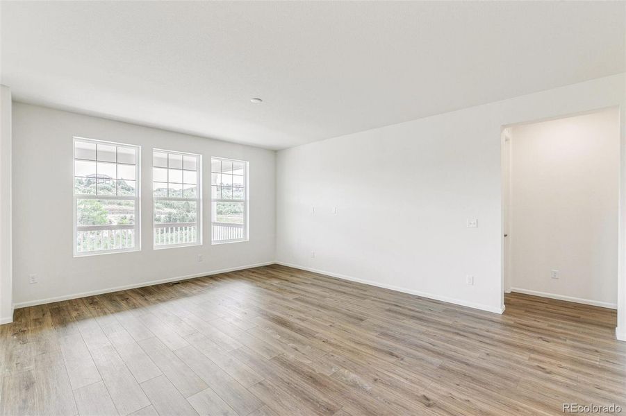 Spacious, unfurnished interior of a new home in Terrain Oak Valley, Castle Rock (Image 17).