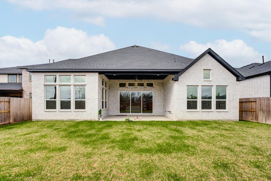 Exterior details and patio area of a home in , Missouri City (Image 29).