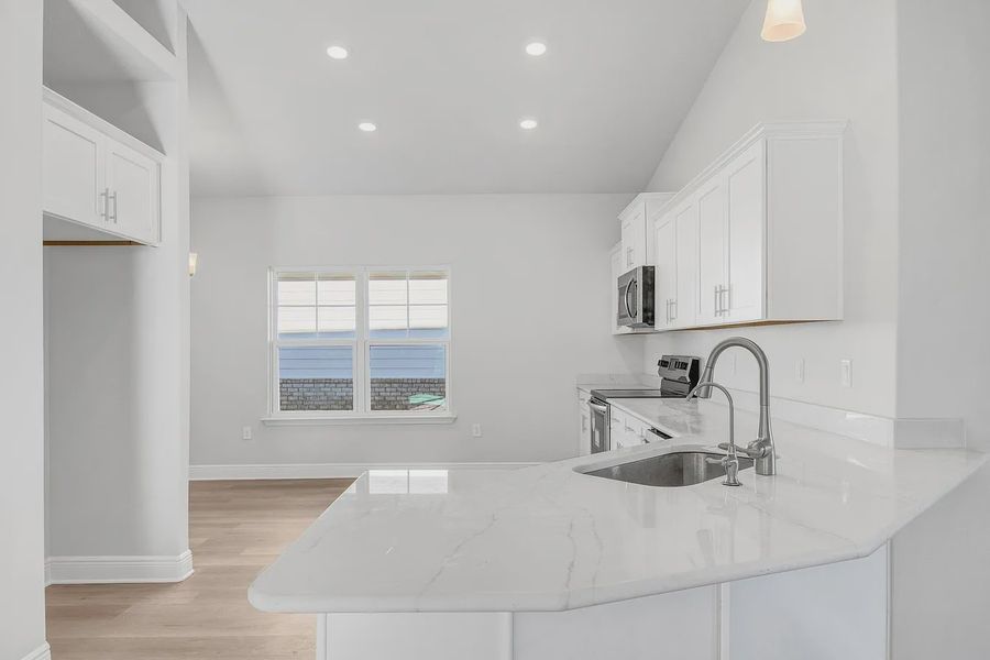 Furnished interior view inside a new home in The Bluffs at Lafayette, Freeport (Image 3).