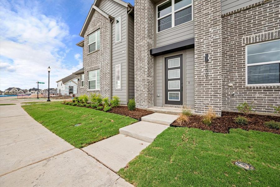 This modern 4 light entry door welcome family and friends into your beautiful new home!