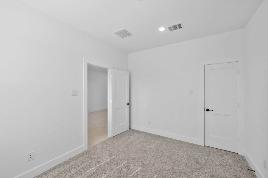 Spacious, unfurnished interior of a new home in Bridgeland, Cypress (Image 27). Spacious, unfurnished interior of a new home in Bridgeland, Cypress (Image 27).