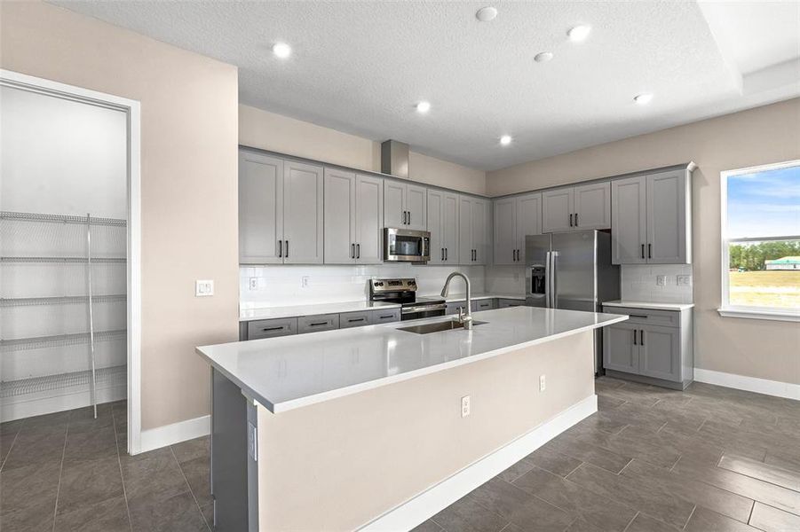 Furnished interior view inside a new home in Gray Hawk at Hole Two, Daytona Beach (Image 18). Furnished interior view inside a new home in Gray Hawk at Hole Two, Daytona Beach (Image 18).