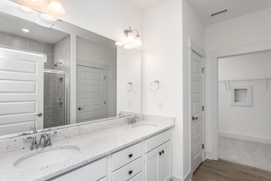 Furnished interior view inside a new home in The Enclave at Hidden Lake - 55+ Community, Youngsville (Image 12).