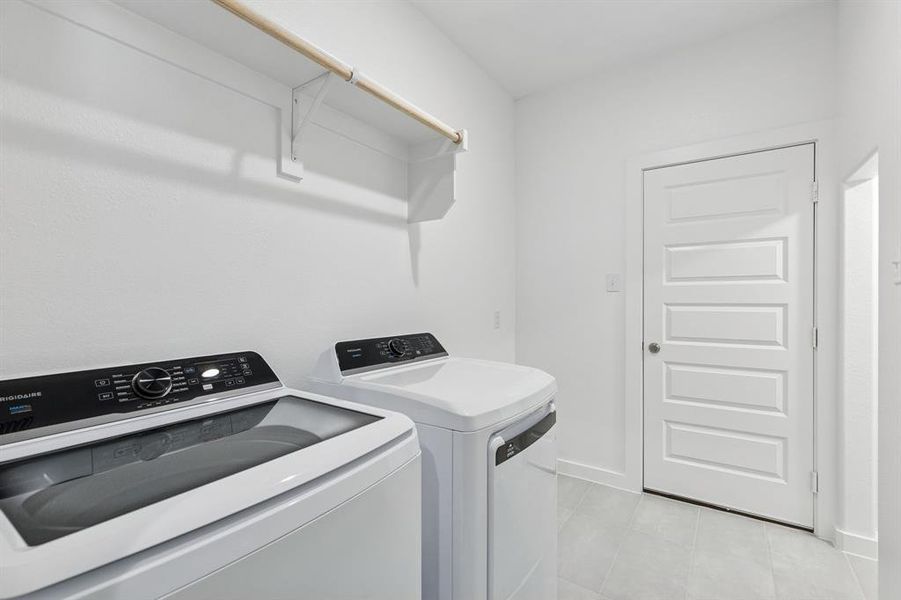Utility Room in the Holden home plan by Trophy Signature Homes – REPRESENTATIVE PHOTO Utility Room in the Holden home plan by Trophy Signature Homes – REPRESENTATIVE PHOTO