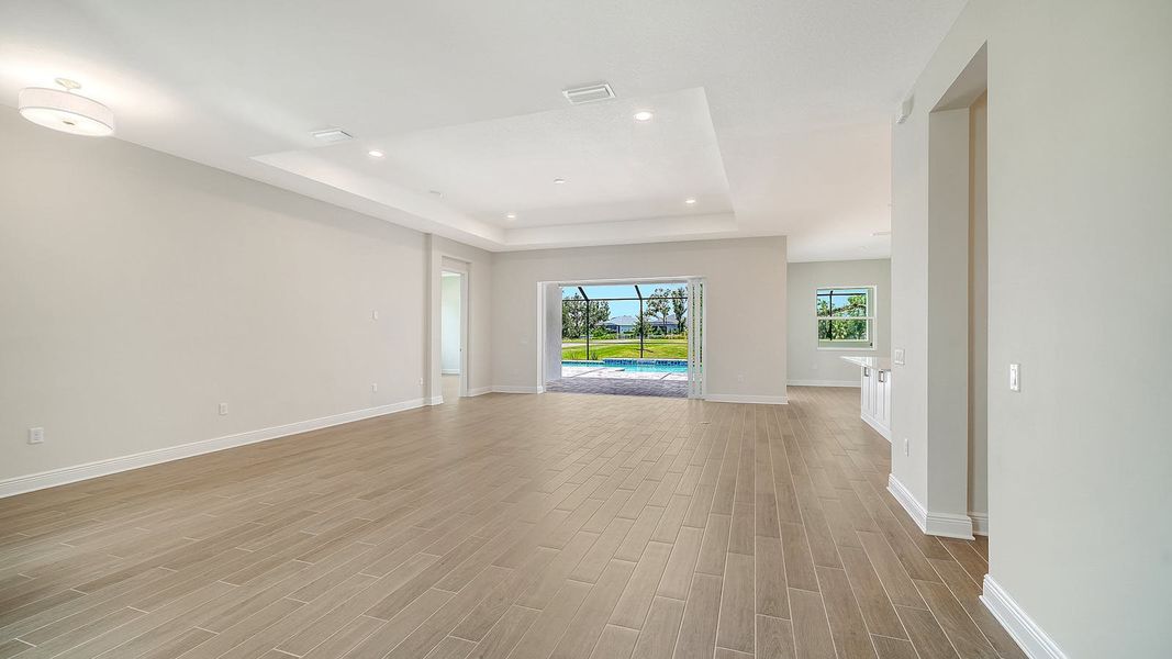 Spacious, unfurnished interior of a new home in Canoe Creek Real Estate and Homes for Sale in Parrish, FL - Neal Communities, Parrish (Image 35).