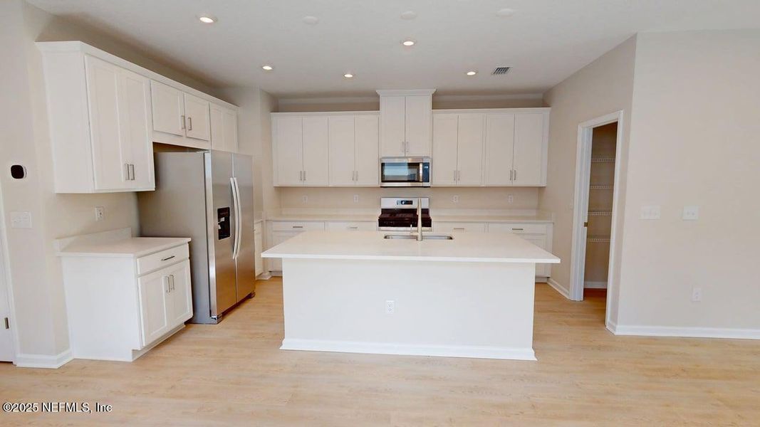 Furnished interior view inside a new home in RiverTown - Forest, St. Johns (Image 5).