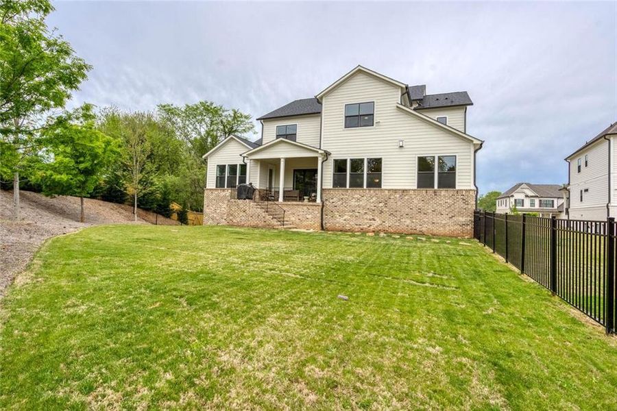 Front exterior of a new home in , Marietta, GA, highlighting curb appeal (Image 1). Front exterior of a new home in , Marietta, GA, highlighting curb appeal (Image 1).