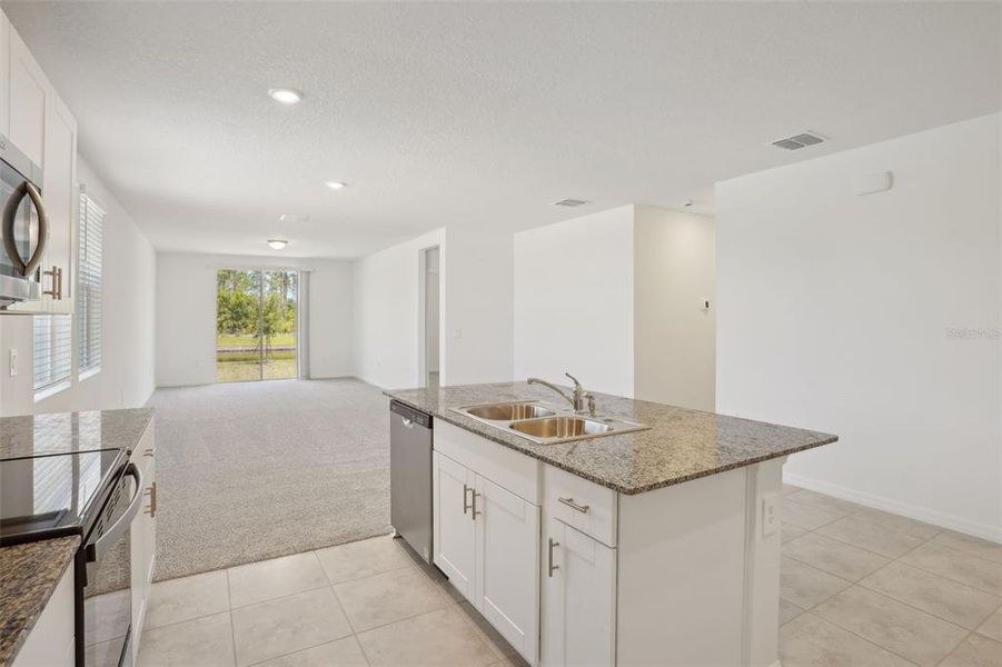 Furnished interior view inside a new home in Lake Deer Estates - Signature Series, Poinciana (Image 12). Furnished interior view inside a new home in Lake Deer Estates - Signature Series, Poinciana (Image 12).