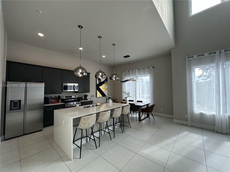 Furnished interior view inside a new home in , Kissimmee (Image 9).