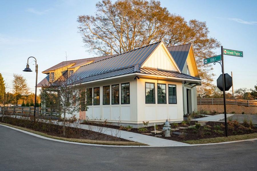 Front exterior of a new home in Harmony, Auburn, GA, highlighting curb appeal (Image 24). Front exterior of a new home in Harmony, Auburn, GA, highlighting curb appeal (Image 24).