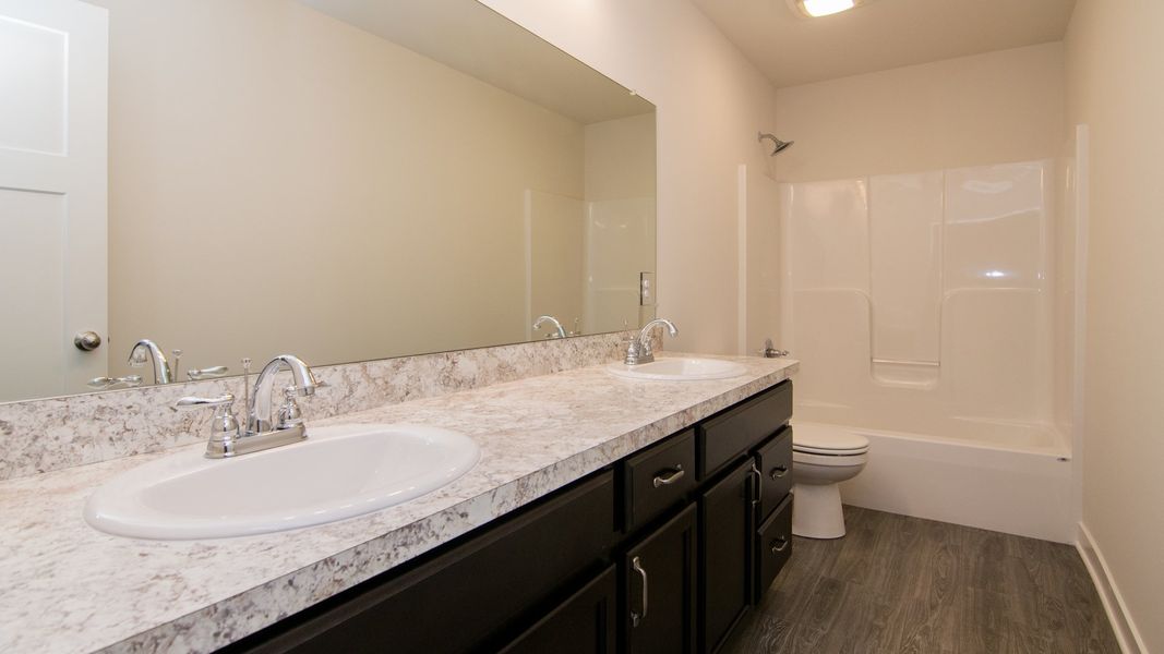 Image 84 representing the The Hartland by Norfolk Homes in Coronado Estates, Jackson, MI.