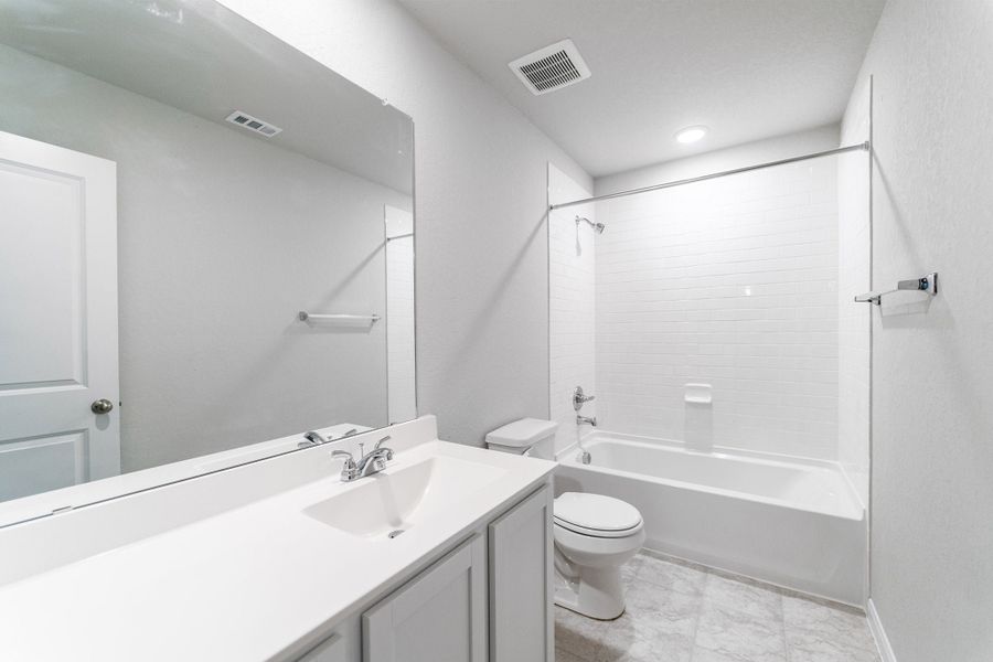 Furnished interior view inside a new home in Hennersby Hollow, San Antonio (Image 9).