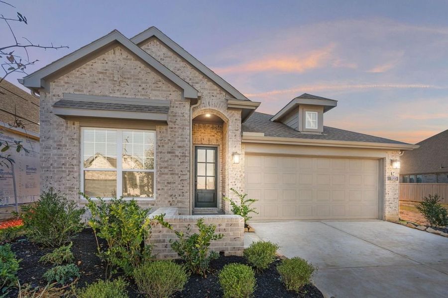Front exterior of a new home in Bridgeland, Cypress, TX, highlighting curb appeal (Image 22).