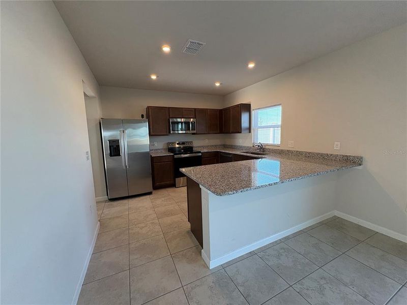Furnished interior view inside a new home in , Haines City (Image 29).