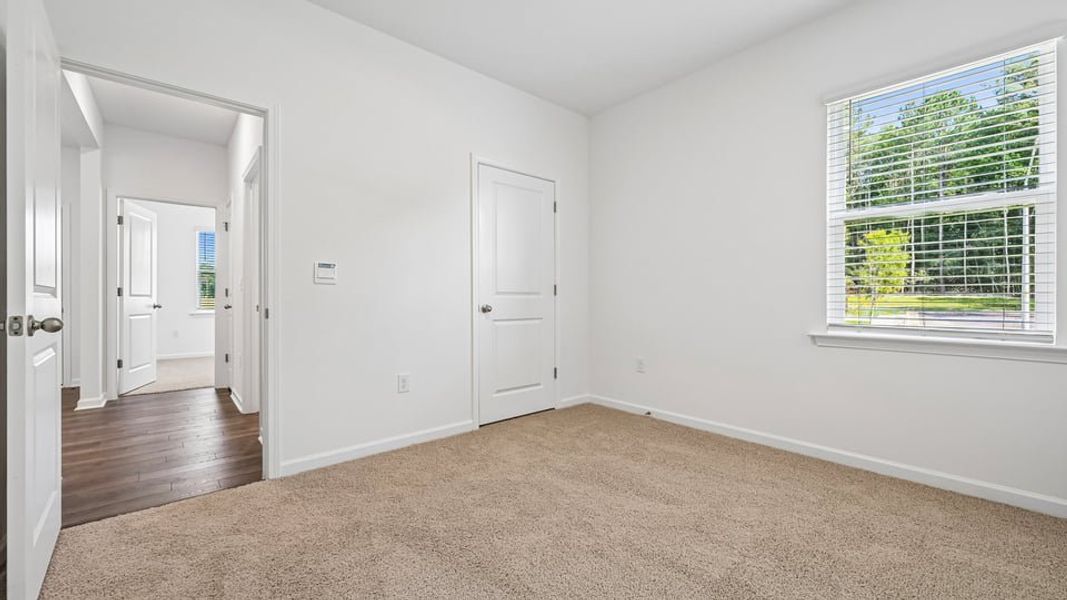 Representative unfurnished interior of a home built from the Aria by D.R. Horton in The Villas at Laurel Oaks, Sanford (Image 25). Representative unfurnished interior of a home built from the Aria by D.R. Horton in The Villas at Laurel Oaks, Sanford (Image 25).