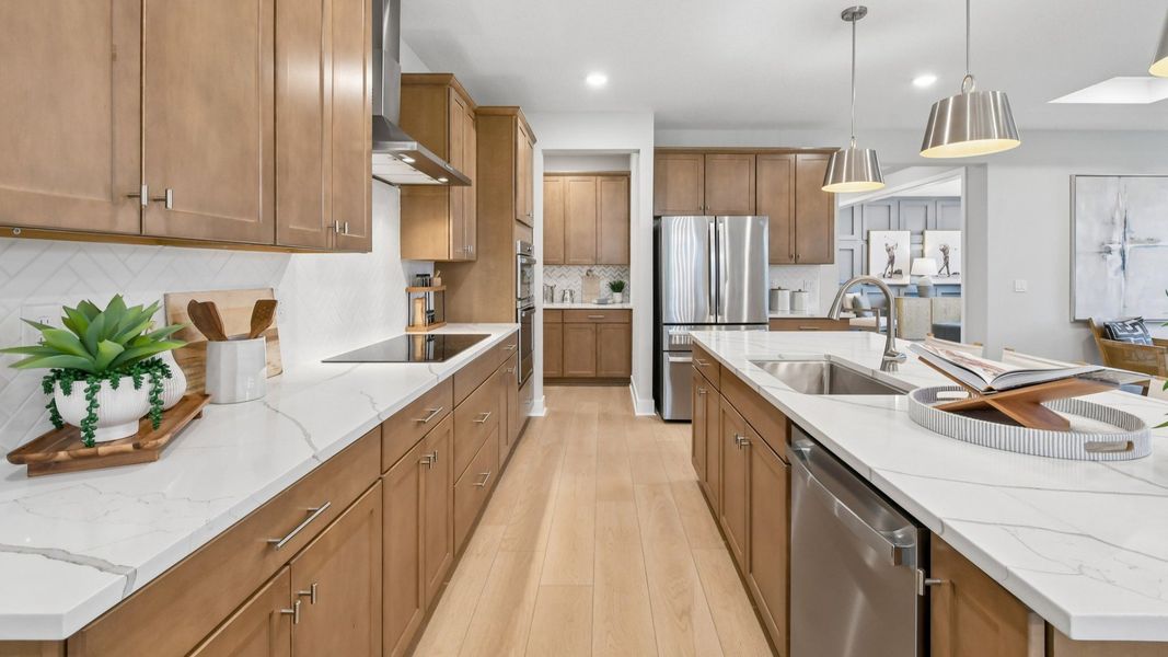 Kitchen in the Marigold Floor Plan at Haven at Diamond Springs