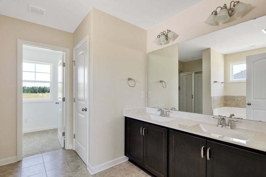 Representative furnished interior of a home built from the Brunswick by Caviness & Cates Communities in Maggie Way, Wendell (Image 66). Representative furnished interior of a home built from the Brunswick by Caviness & Cates Communities in Maggie Way, Wendell (Image 66).