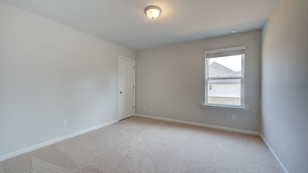 Furnished interior view inside a new home in Hamilton Lakes, Loganville (Image 18).