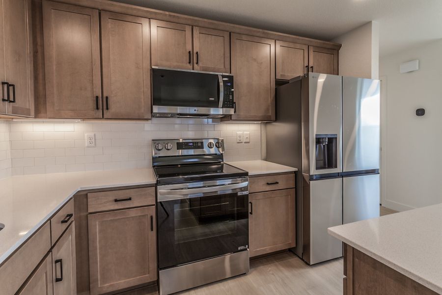 Furnished interior view inside a new home in Prairie Song Cottages, Windsor (Image 12).
