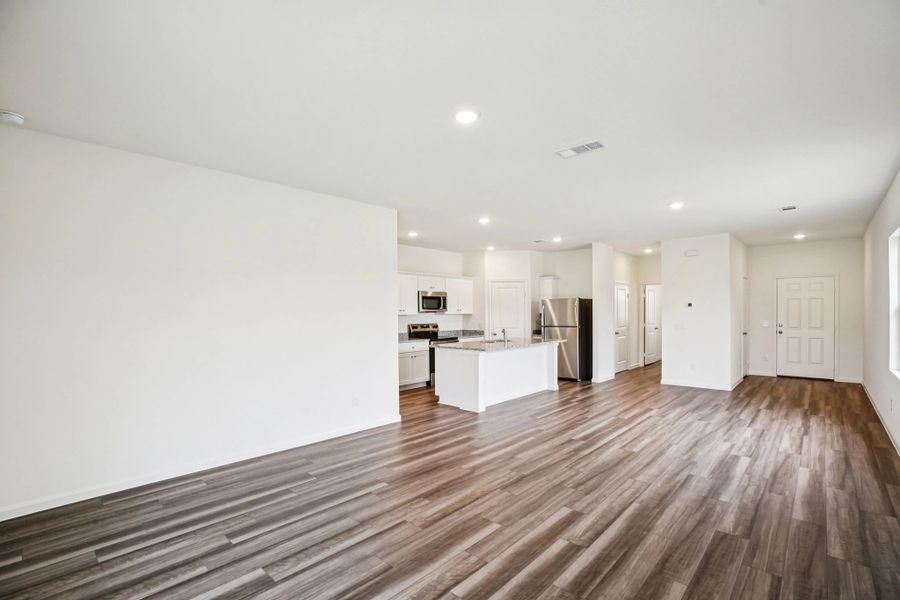 Representative unfurnished interior of a home built from the Glimmer by Starlight Homes in Spring Creek Trails, Magnolia (Image 14).