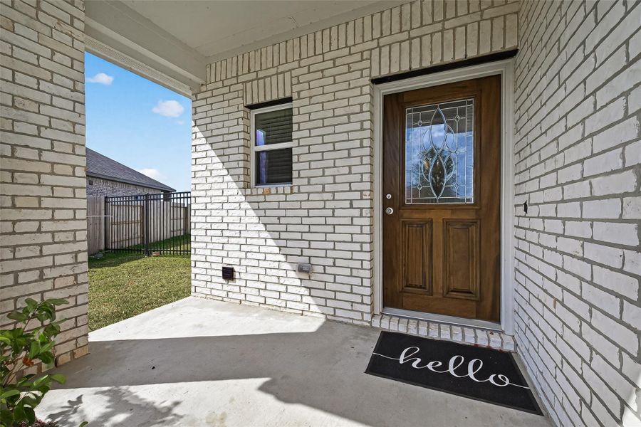 Exterior details and patio area of a home in Sunterra, Katy (Image 27).
