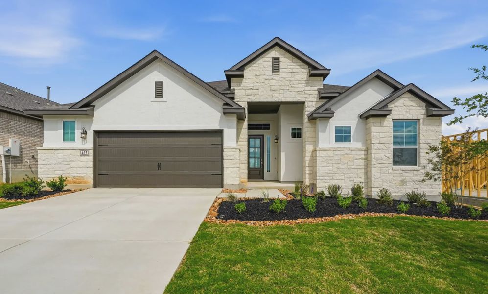Representative exterior photo of a completed home built from the Mackenzie by Chesmar Homes in Esperanza 60's, Boerne, TX (Image 21).