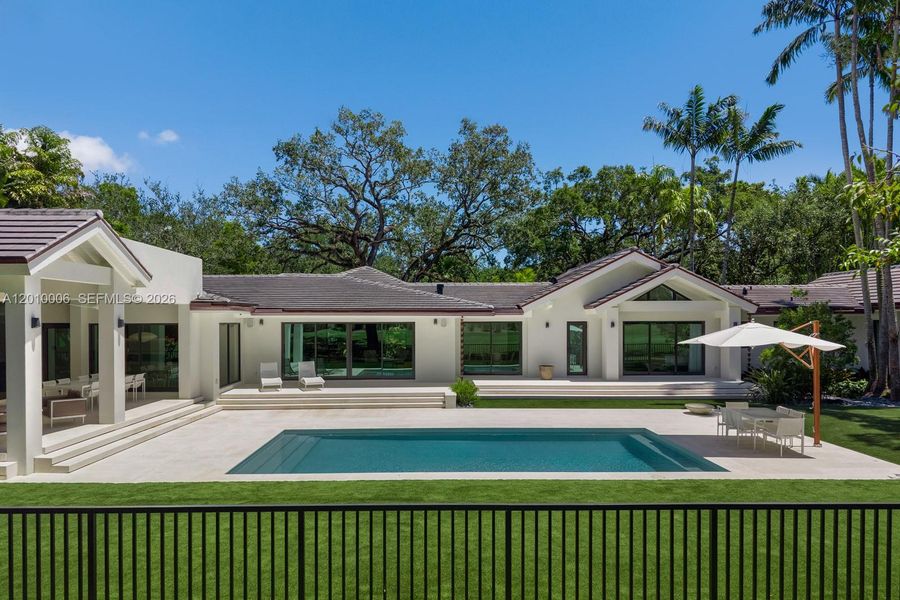 Exterior details and patio area of a home in , Coral Gables (Image 3).
