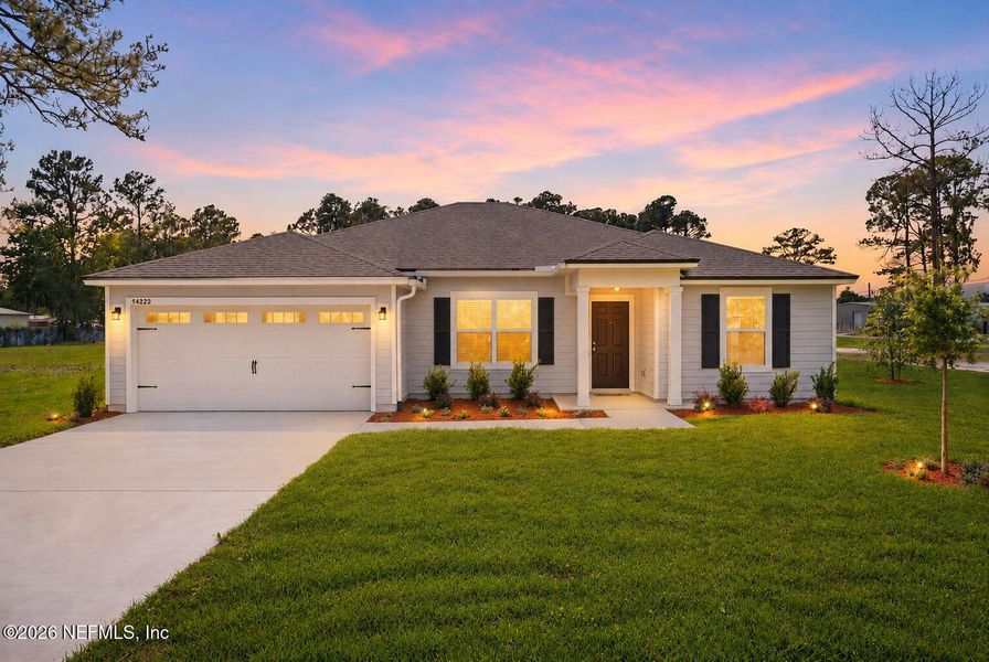 Front exterior of a new home in , Jacksonville, FL, highlighting curb appeal (Image 26). Front exterior of a new home in , Jacksonville, FL, highlighting curb appeal (Image 26).