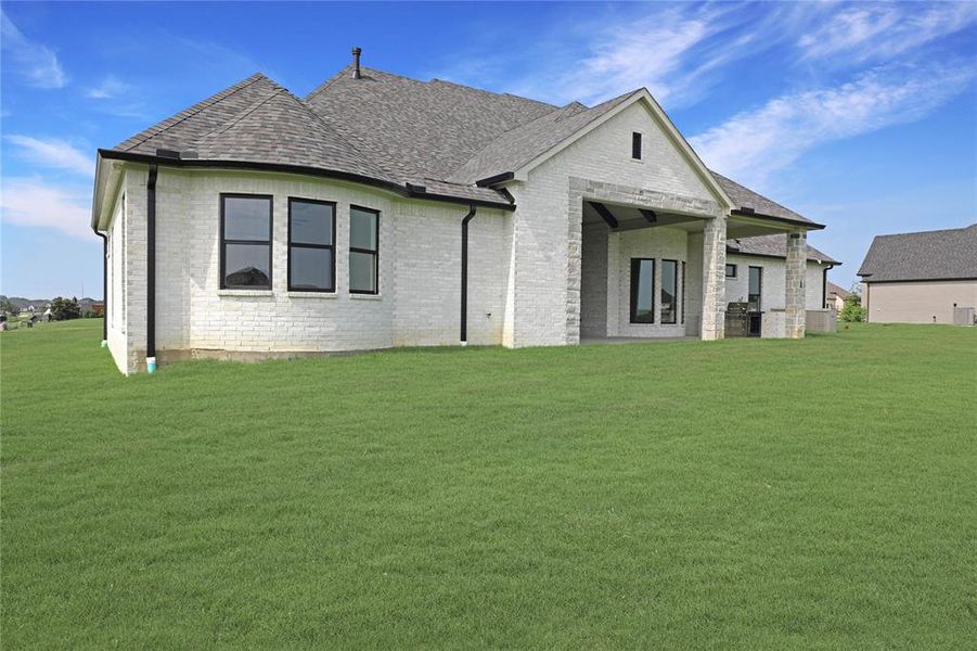 Front exterior of a new home in , Weston, TX, highlighting curb appeal (Image 25).