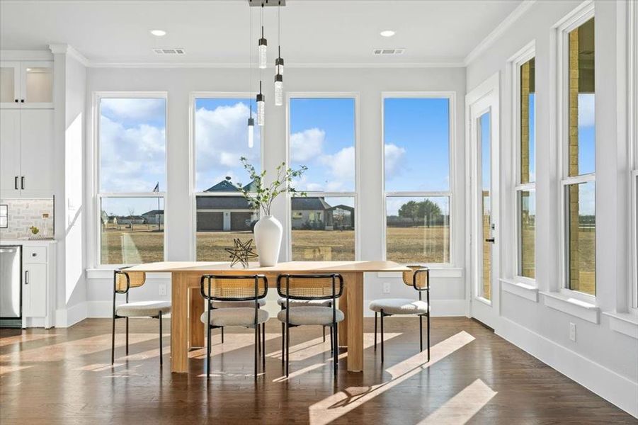 Sunroom featuring a healthy amount of sunlight