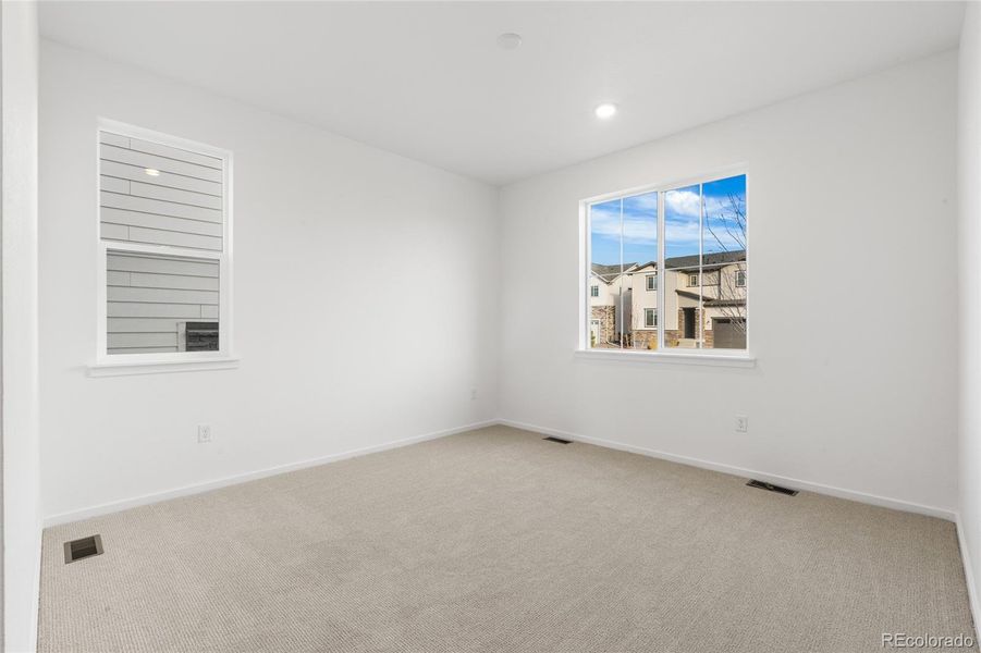 Spacious, unfurnished interior of a new home in Harvest Crossing, Aurora (Image 19).