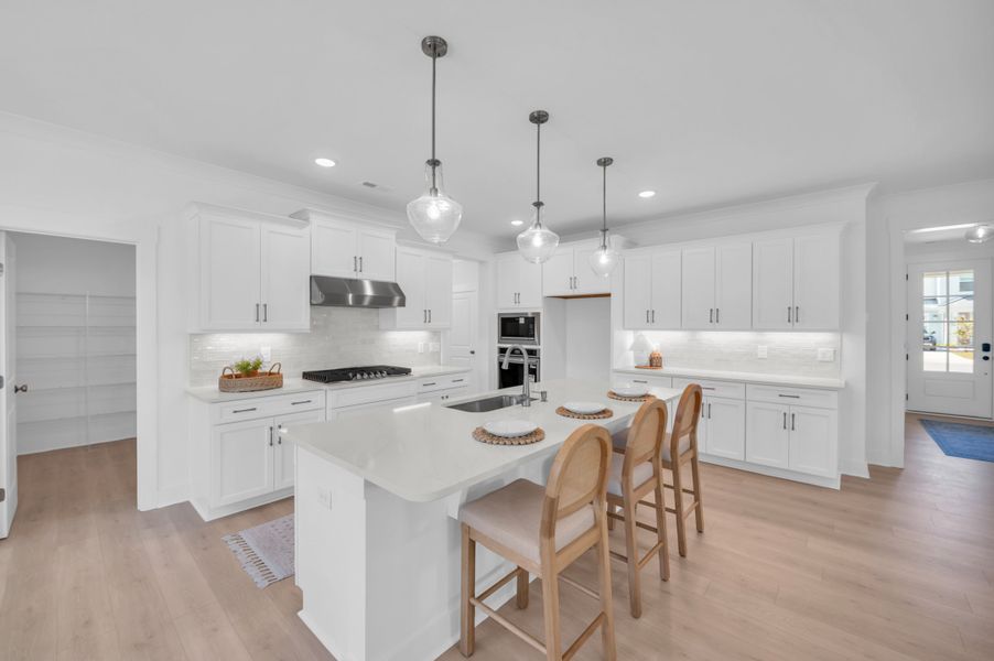 Representative furnished interior of a home built from the The Whitley by RobuckHomes in Windwater, Hampstead (Image 58).