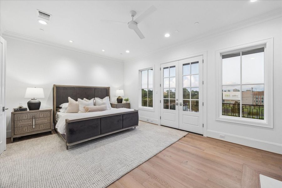 Another view shows the french doors that open to a balcony.