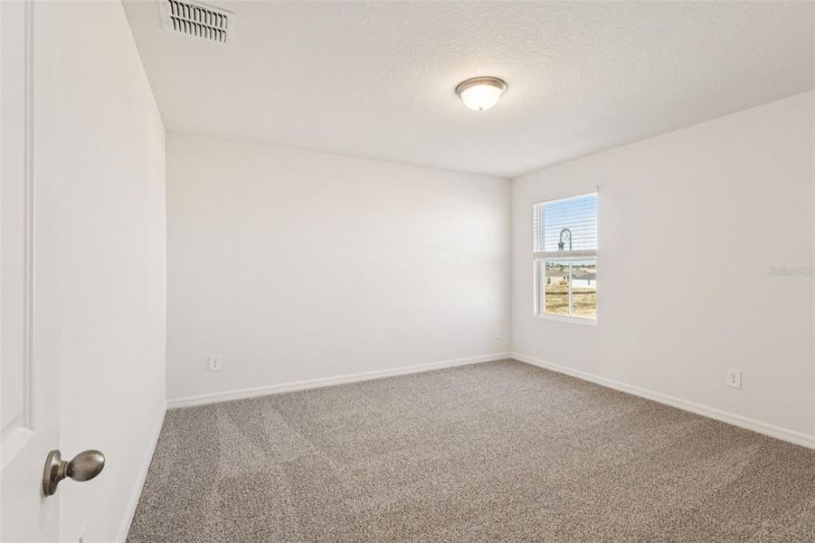 Spacious, unfurnished interior of a new home in The Reserve at Hammock Oaks - Classic Series, Lady Lake (Image 20).