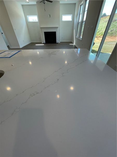 This bright interior features high ceilings, a fir