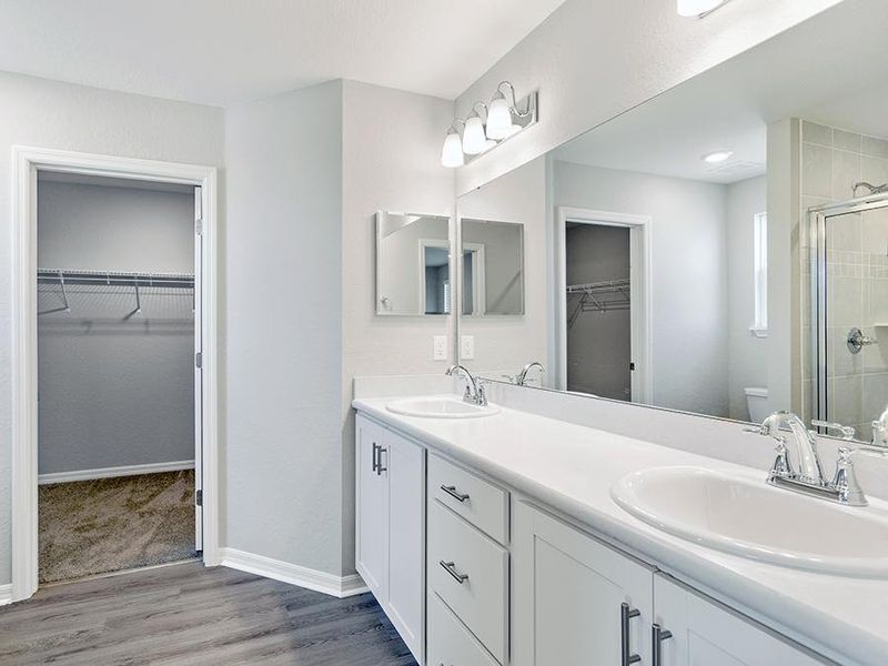 Your suite is complete with a large walk-in wardrobe and en-suite bath.