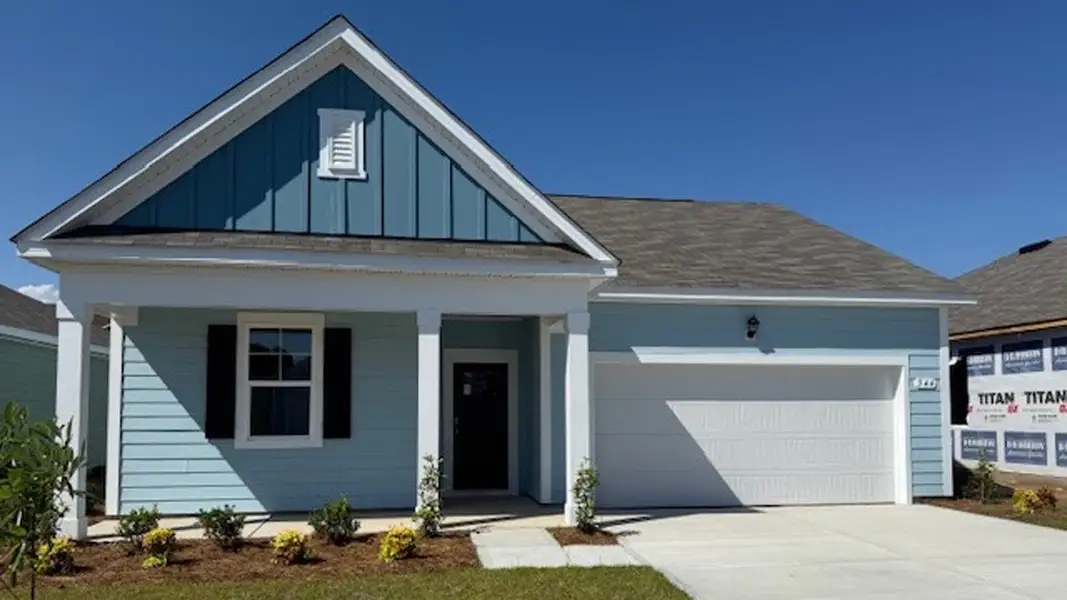 Front exterior of a new home in Auberon Woods, Conway, SC, highlighting curb appeal (Image 2). Front exterior of a new home in Auberon Woods, Conway, SC, highlighting curb appeal (Image 2).