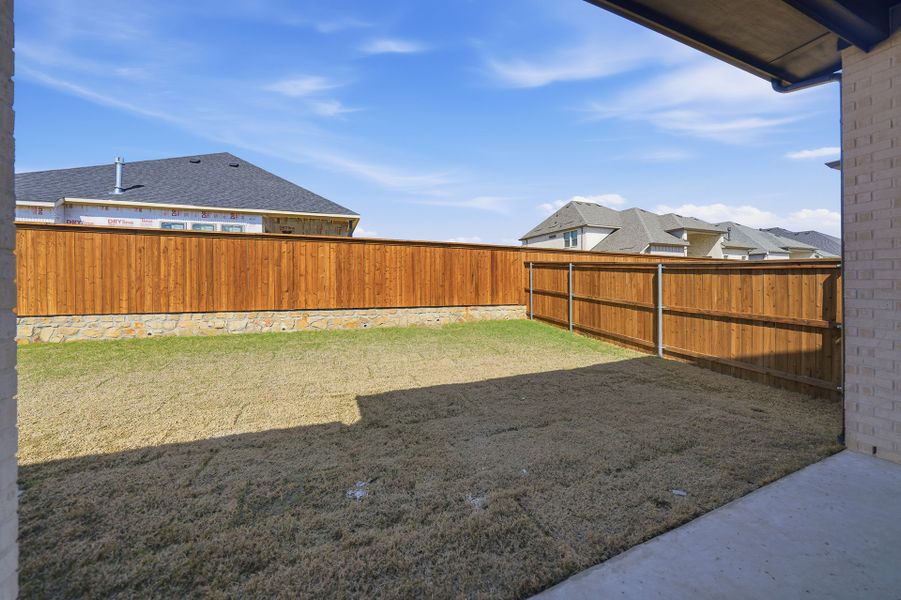 Exterior details and patio area of a home in Brookhollow West, Prosper (Image 4). Exterior details and patio area of a home in Brookhollow West, Prosper (Image 4).
