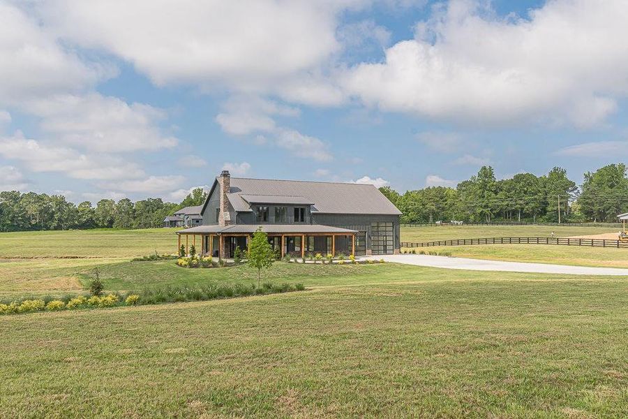 Front exterior of a new home in , Bremen, GA, highlighting curb appeal (Image 2). Front exterior of a new home in , Bremen, GA, highlighting curb appeal (Image 2).