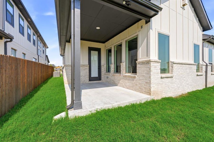 Exterior details and patio area of a home in Parks of Aledo, Aledo (Image 4).