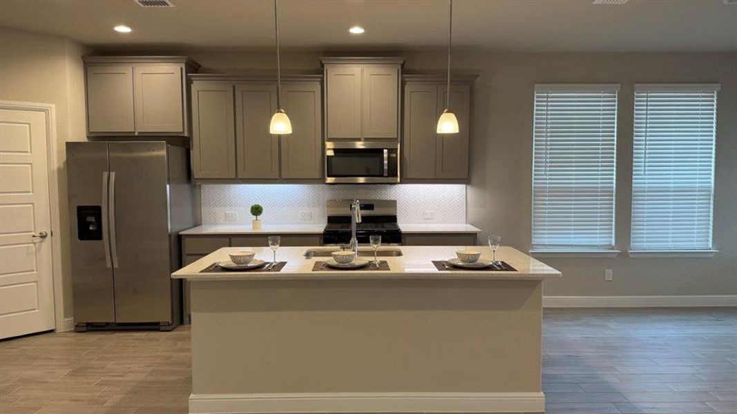 Kitchen - All Home and community information, including pricing, included features, terms, availability and amenities, are subject to change at any time without notice or obligation. All Drawings, pictures, photographs, video, square footages, floor plans, elevations, features, colors and sizes are approximate for illustration purposes only and will vary from the homes as built. Kitchen - All Home and community information, including pricing, included features, terms, availability and amenities, are subject to change at any time without notice or obligation. All Drawings, pictures, photographs, video, square footages, floor plans, elevations, features, colors and sizes are approximate for illustration purposes only and will vary from the homes as built.